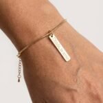 PULSEIRA RABO DE RATO COM PLAQUINHA DINDA TE AMO