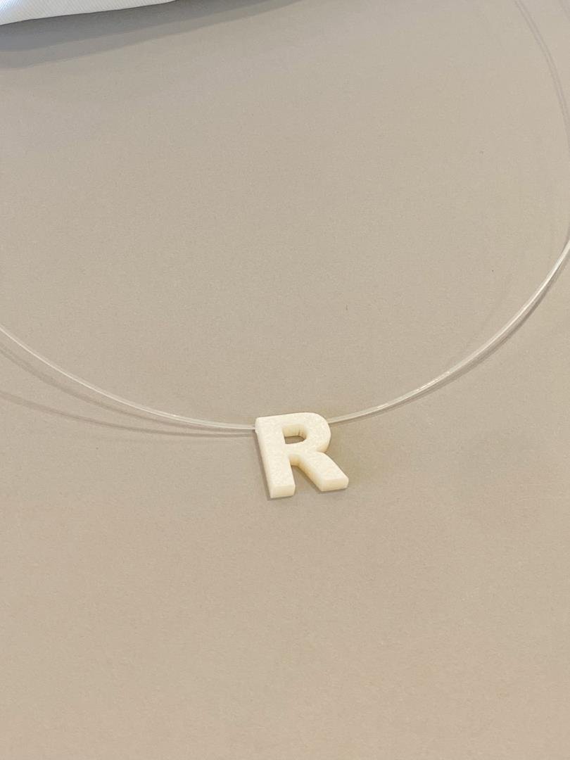 085_4922_produto COLAR NYLON MADRE PEROLA INICIAL R - Imagem 1